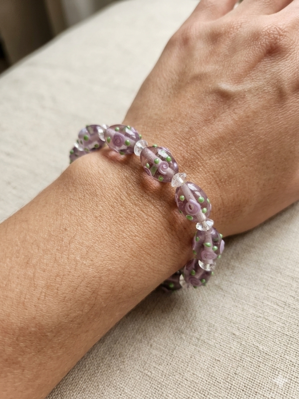 Delicate Handmade 7 Inch Purple Glass Stretch Bead Bracelet with Green Accents